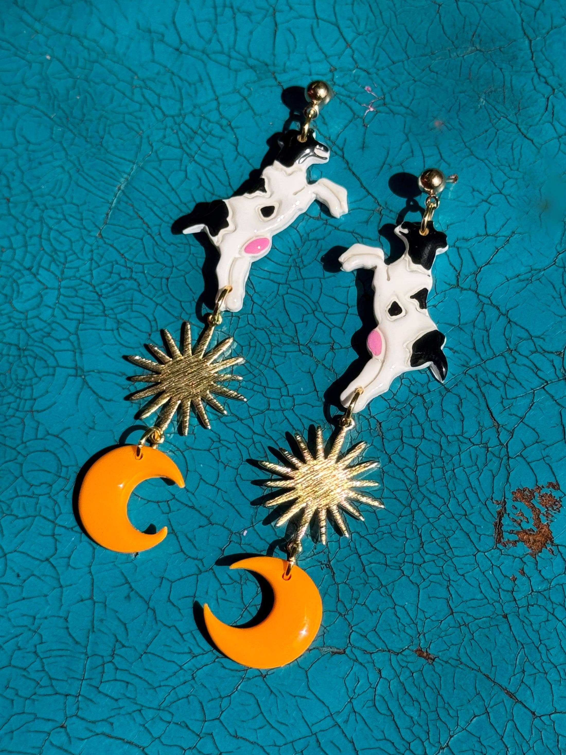 Delaney and Blu - Wholesale Dangle Earrings - Cow Dancing Over The Moon