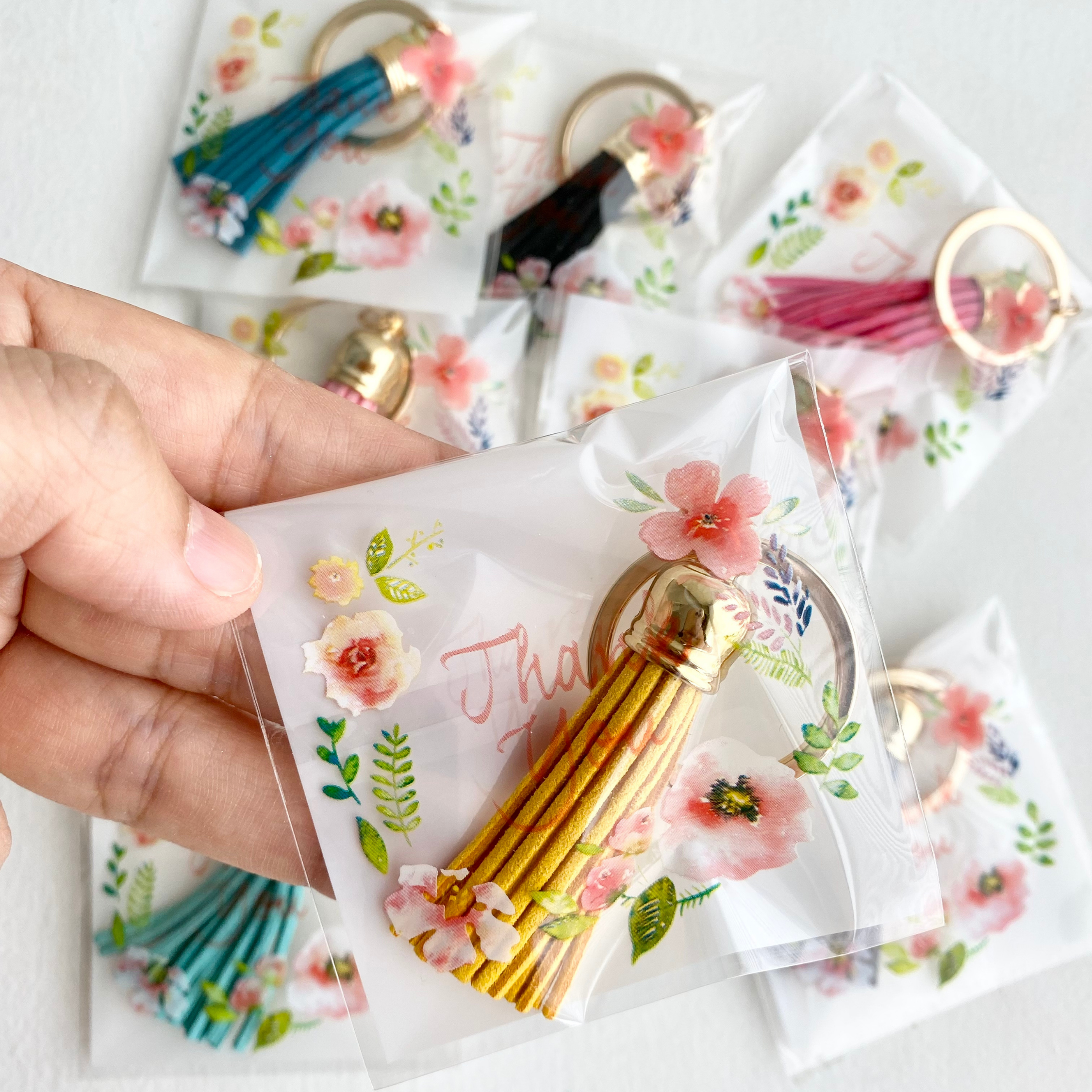 Assortito Regali di Ringraziamento - Mini Portachiavi con Nappa in vendita all'ingrosso su Faire5