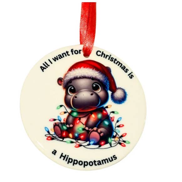 Alt, hvad jeg ønsker mig til jul, er en flodhest-keramikornament. for engroshandel hos Uniquely Designed By Rebecca