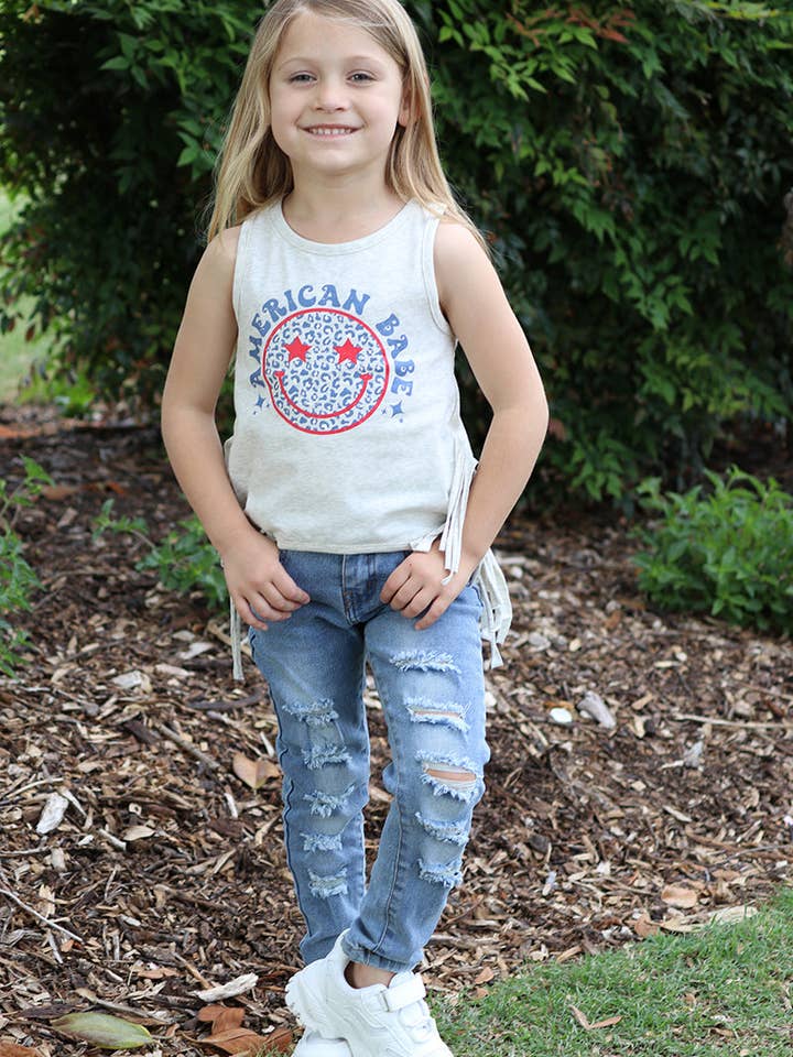 Light blue ripped skinny jeans. png25113066-amy for wholesale by Kids Charm Online