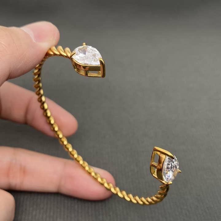Zircon Inlaid 18K Gold Plated Stainless Steel Twist Cuff - FGS for wholesale by Mio Queena