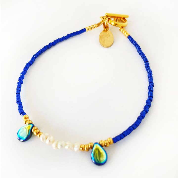 2021-A01-0013 Bracciale Petite Marie - Royal Blue - Perle - Bianco-Oro per la vendita all'ingrosso da parte di Petite Marie Jewelry