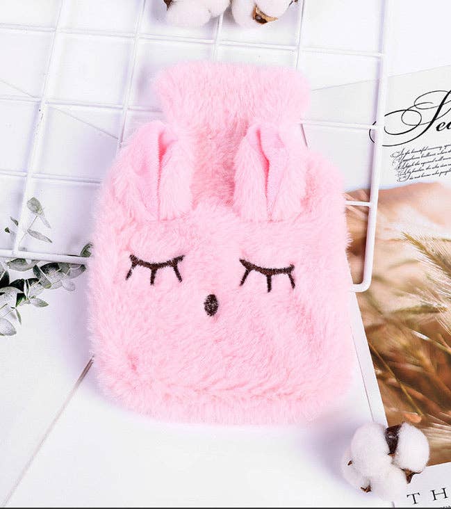 Rosa Wärmflasche und Plüschbezug mit Häschen für den Großhandel auf Faire1