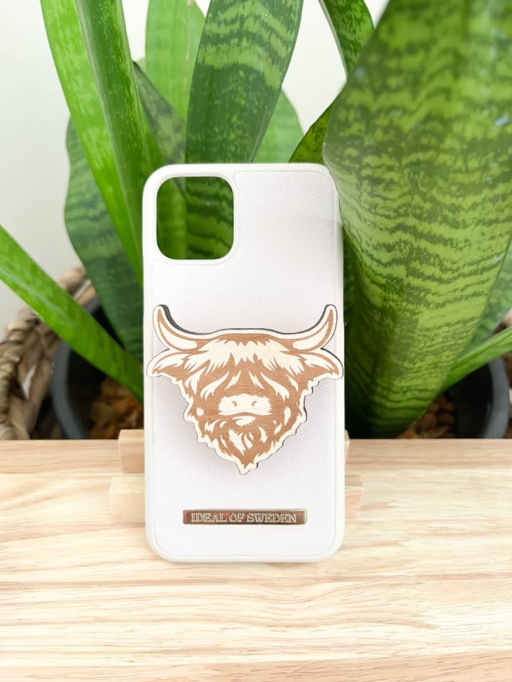 Highlander Cow | Trä telefon grepp för wholesale av Modern Mama