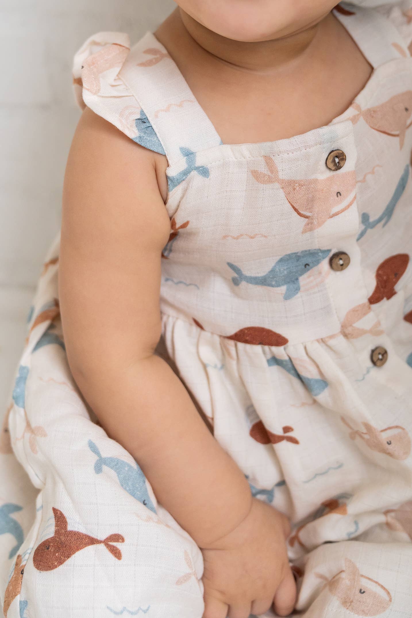 Natural Whales Ruffle & Button Baby Dress+Bloomer (Organic Muslin) for wholesale on Faire2