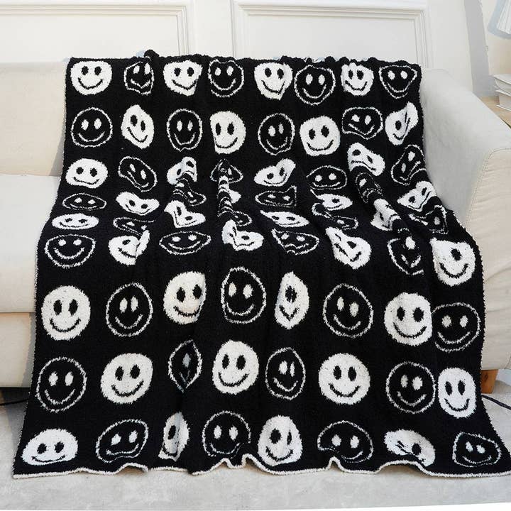SMILING FACE KNITTED JACQUARD BLANKET SOFA BLANKET_CWMM0323 for wholesale by Lovenne