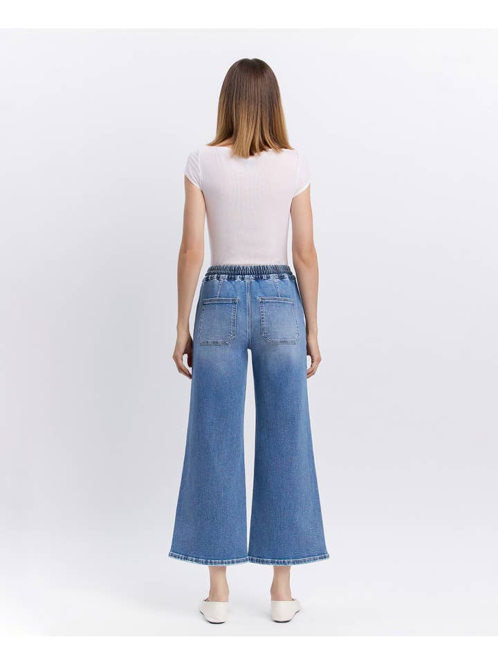 REASSURE HIGH RISE DRAWSTRING WAISTBAND WIDE LEG JEANS V3650 for wholesale on Faire7