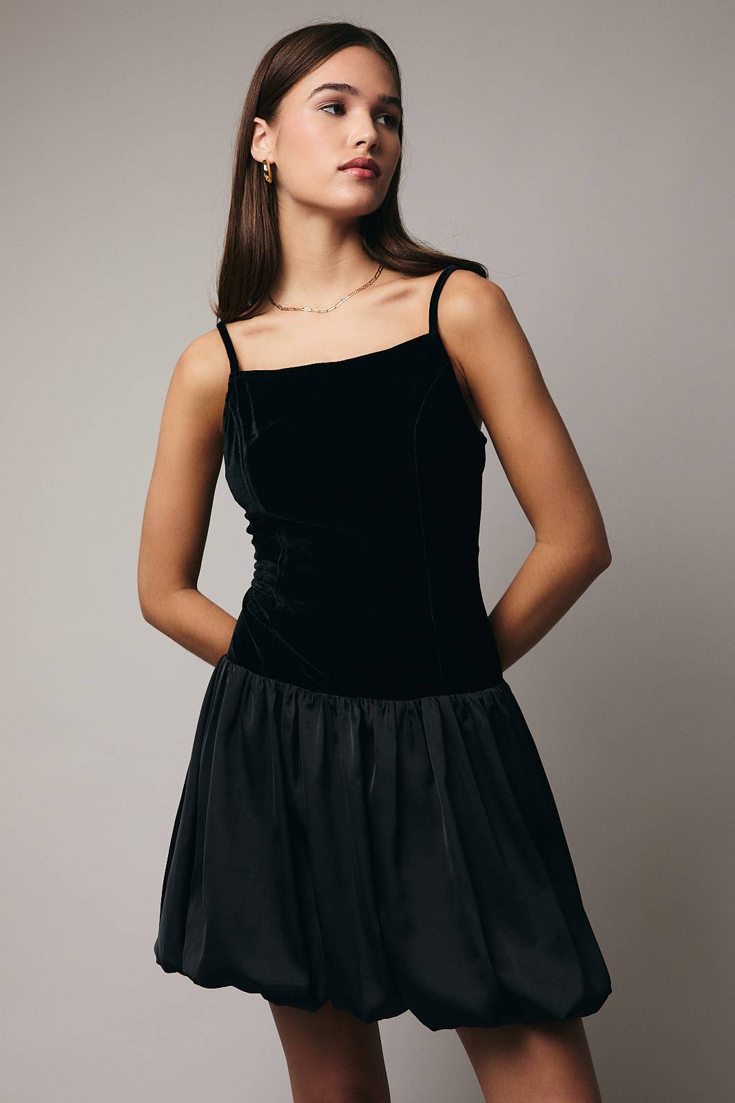 Black SLEEVELESS DROP WAIST BUBBLE HEM DRESS for wholesale on Faire