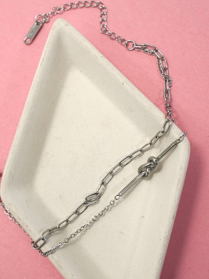 18K STAINLESS STEEL TARNISH FREE KNOT BRACELET | 40B5144 for wholesale by JOSSLYN by wall to wall