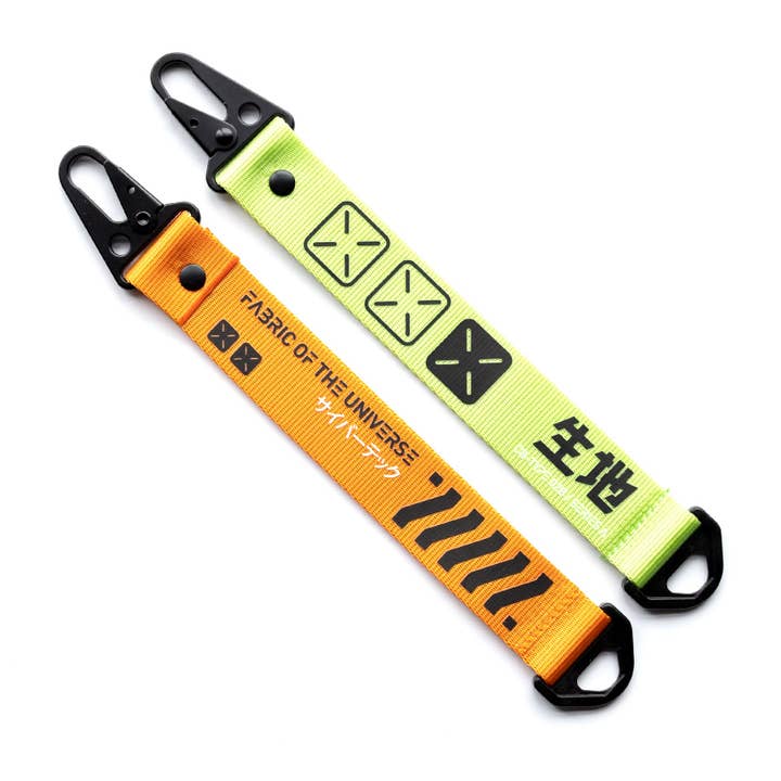 Set di portachiavi con etichetta pendente CBR-002 LO per la vendita all'ingrosso da parte di Fabric of the Universe