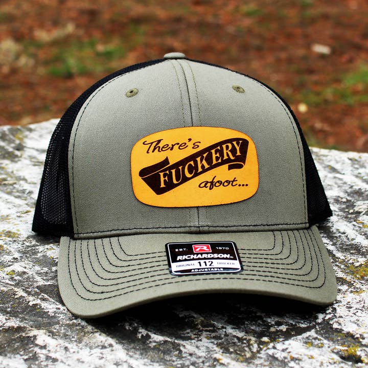 "There's Fuckery Afoot" Leather Patch Hat for wholesale by Overholt Supply Co.