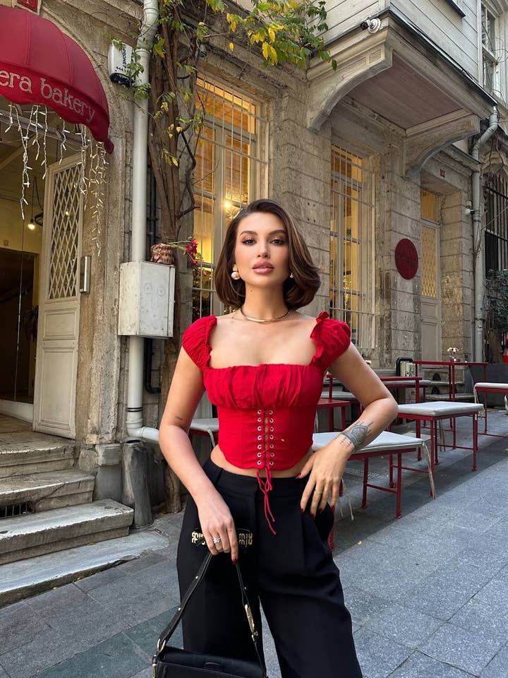 Standpoint Top - Wholesale Blouse - Women's - Ruffle-Trim Lace-Up Corset Top – 110611