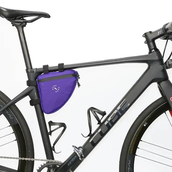 Small purple triangular bicycle frame bag for wholesale by Bomence