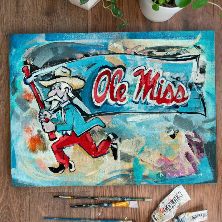 Ole Miss Rebels "Throwback Reb mit der Flagge" | Originalgemälde auf 12x16 Fredrix-Leinwandplatte für den Großhandel von Brandon Art Co