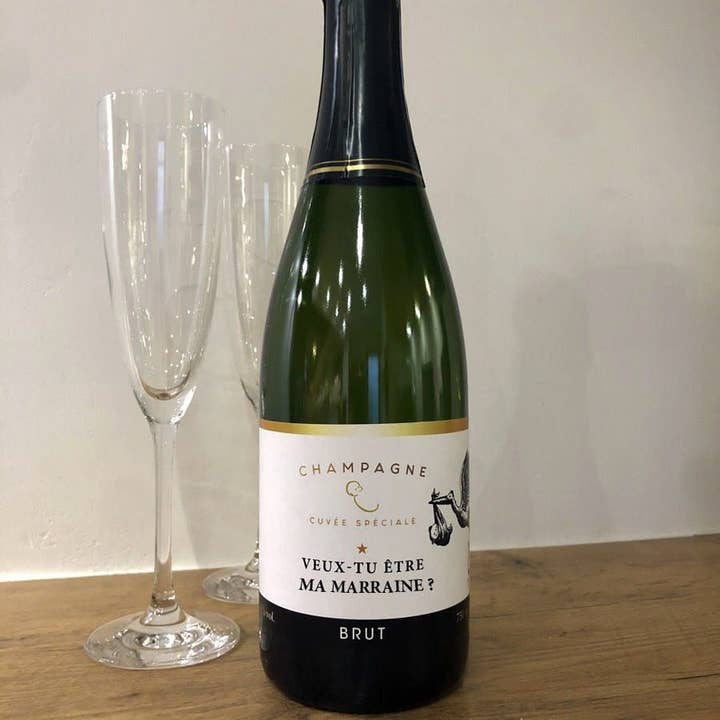 Etichetta bottiglia di Champagne La famiglia si allarga per la vendita all'ingrosso da parte di La vie en magenta