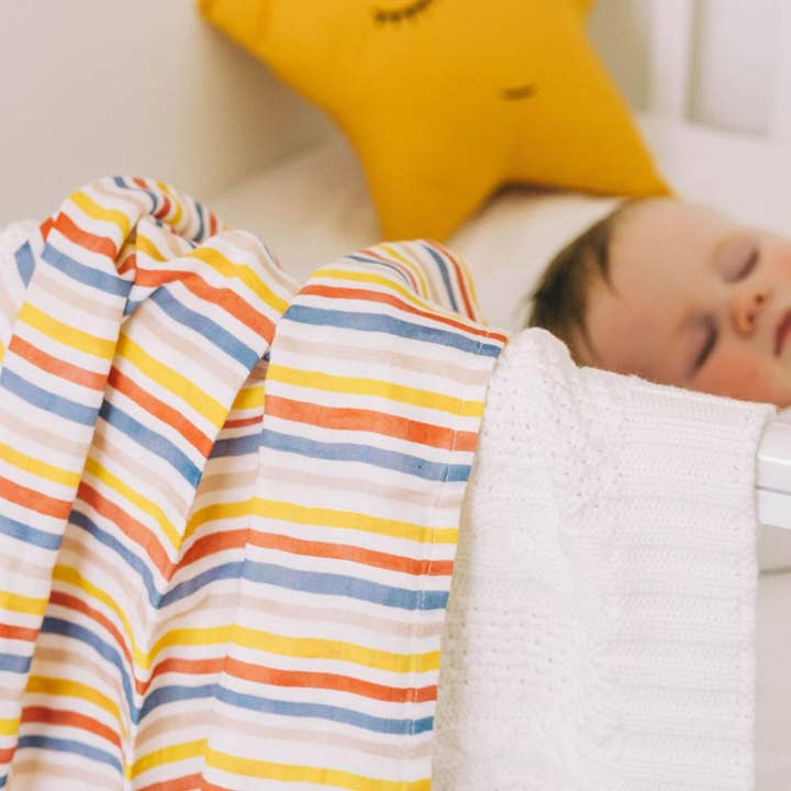 Rainbow Stripe Muslin Blanket for wholesale by Beach Born Salcombe Ltd