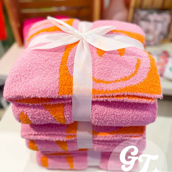 Lux Neon Pink Happy Throw Blanket for wholesale on Faire