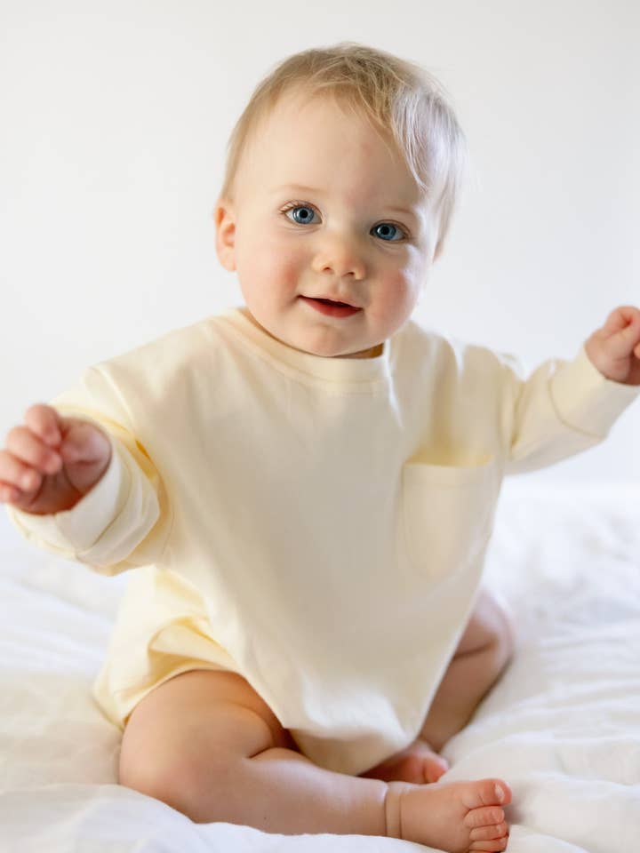 Long Sleeve Baby T-Shirt Romper in Vanilla for wholesale by Winnie + Crew
