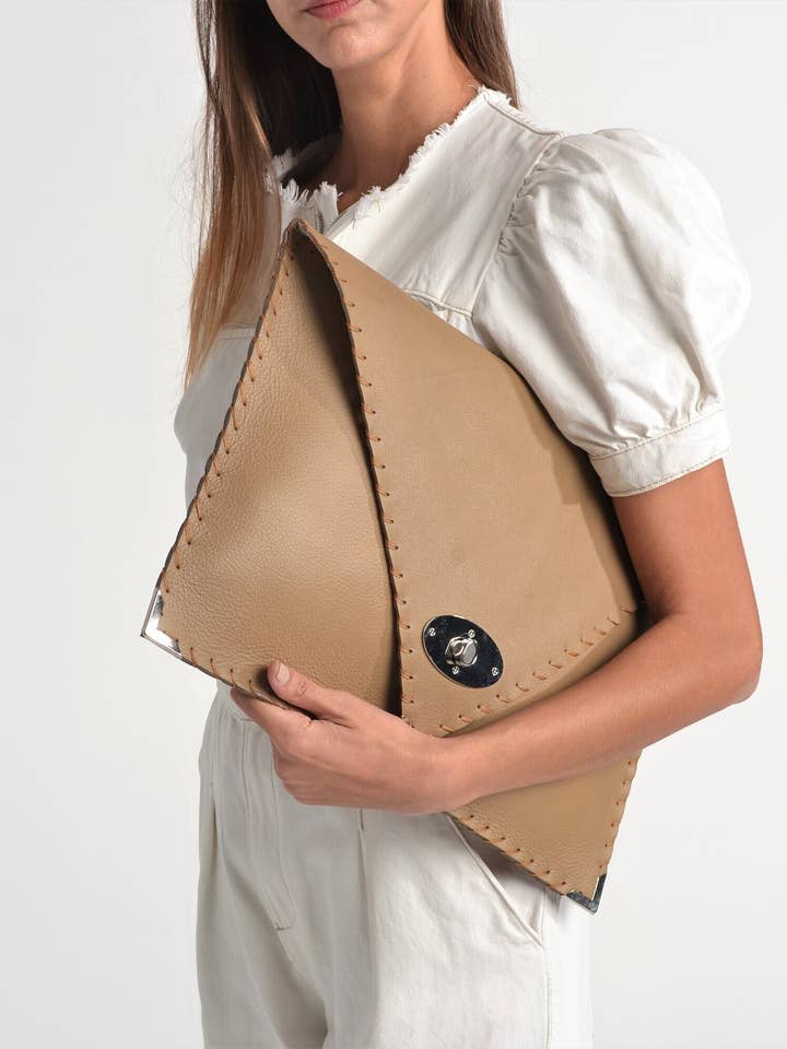 Symmetria leather clutch in sand beige for wholesale by ANA KOUTSI