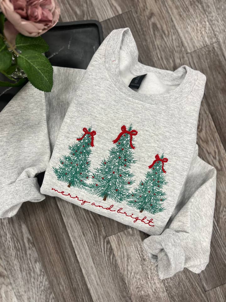 Coquette Merry and Bright Christmas Crewneck and other Purchase Wholesale merry and bright sweatshirt. Free Returns & Net 60 Terms on Faire trending on Faire.