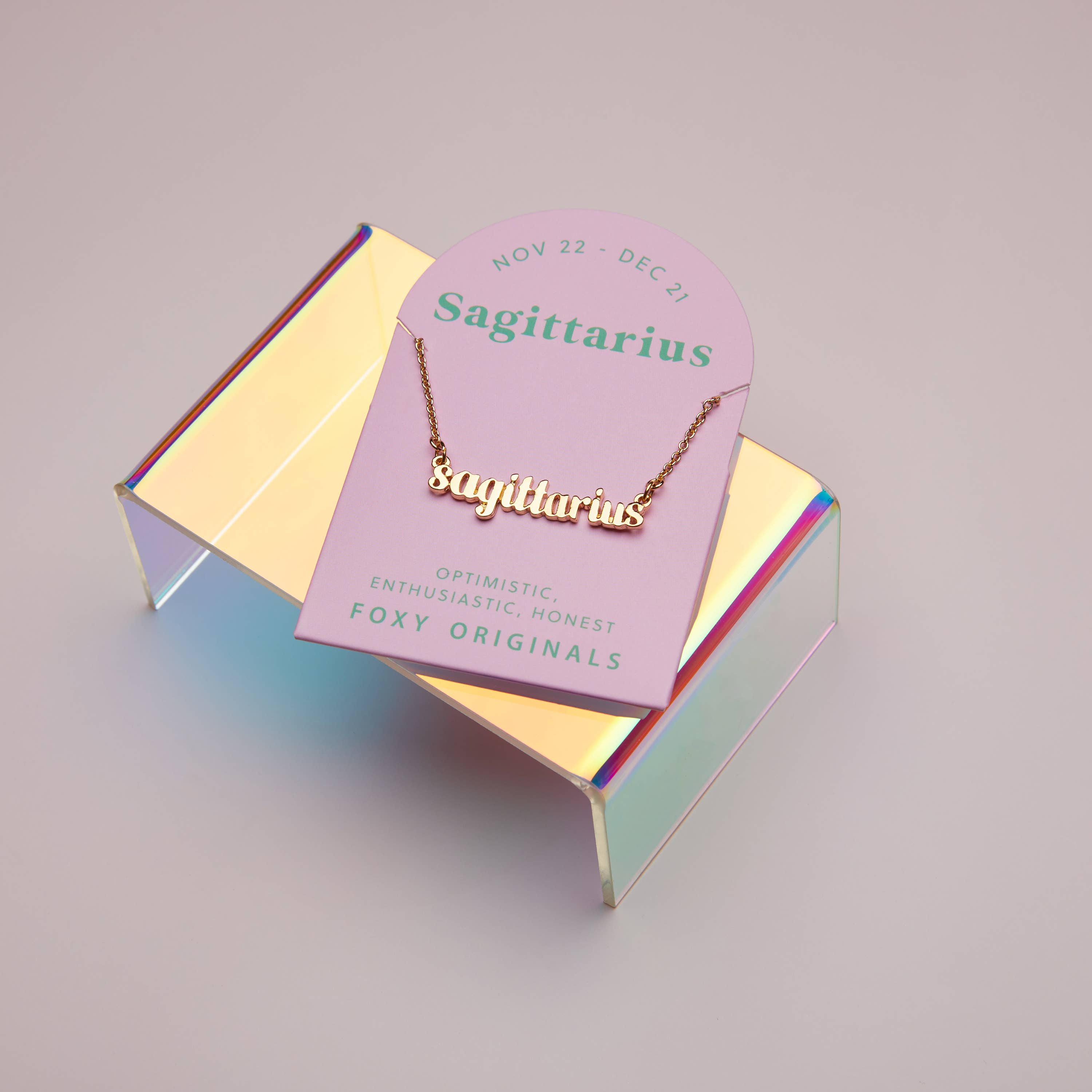 Gold Zodiac Sagittarius Script Necklace | Horoscope Accessories for wholesale on Faire