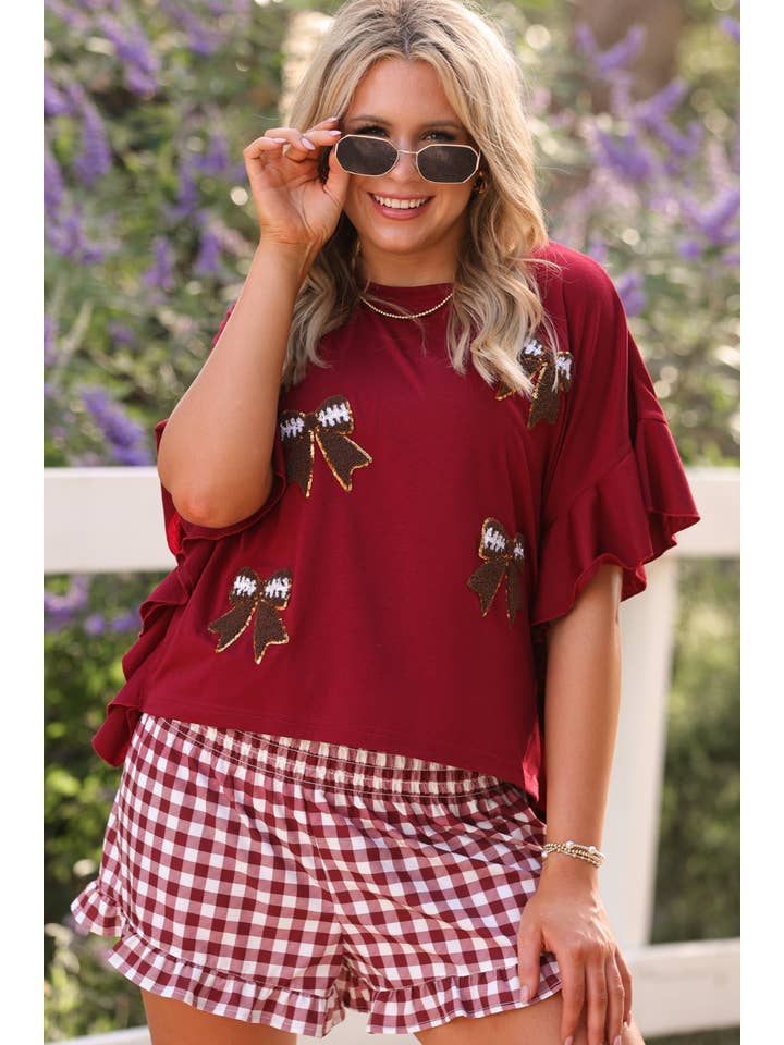 Sideline Sparkle Ruffle Top- Maroon for wholesale on Faire3