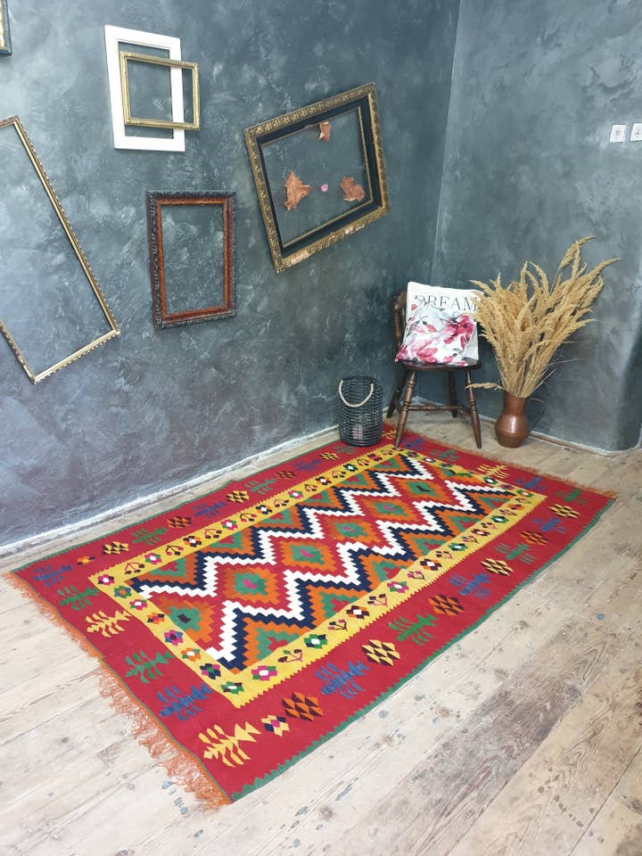 Vintage Romanian kilim, red and green background for wholesale by MADE WITH LOVE RO SRL