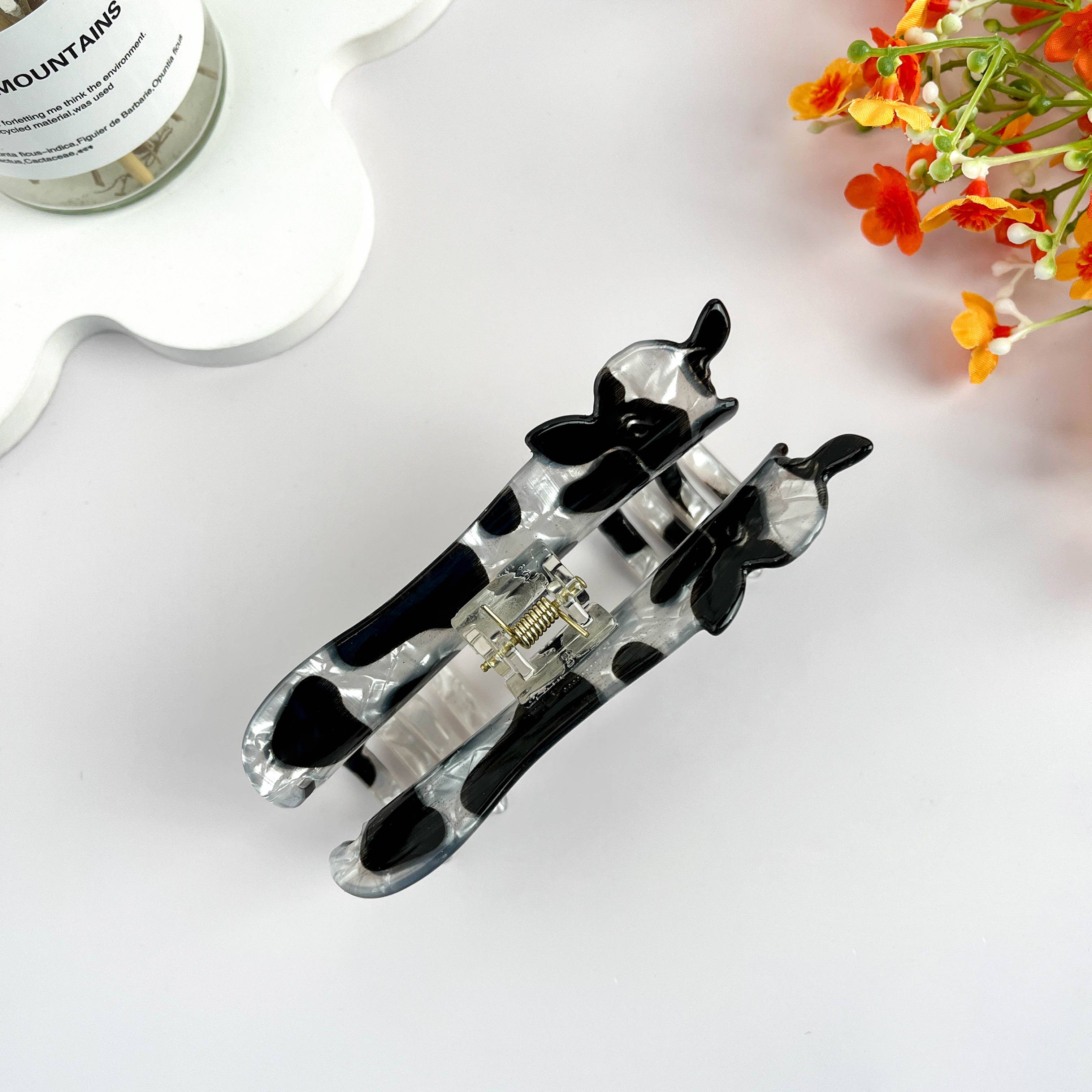 Black and White Cow Animal Hair Claw Clip for wholesale on Faire5