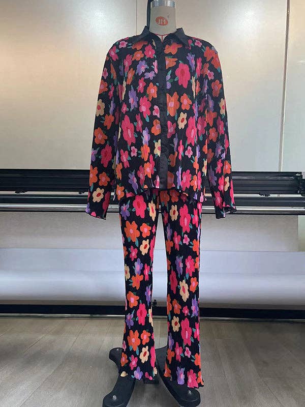 NERO Set di due pezzi con camicia e pantaloni plissettati con stampa floreale in vendita all'ingrosso su Faire3