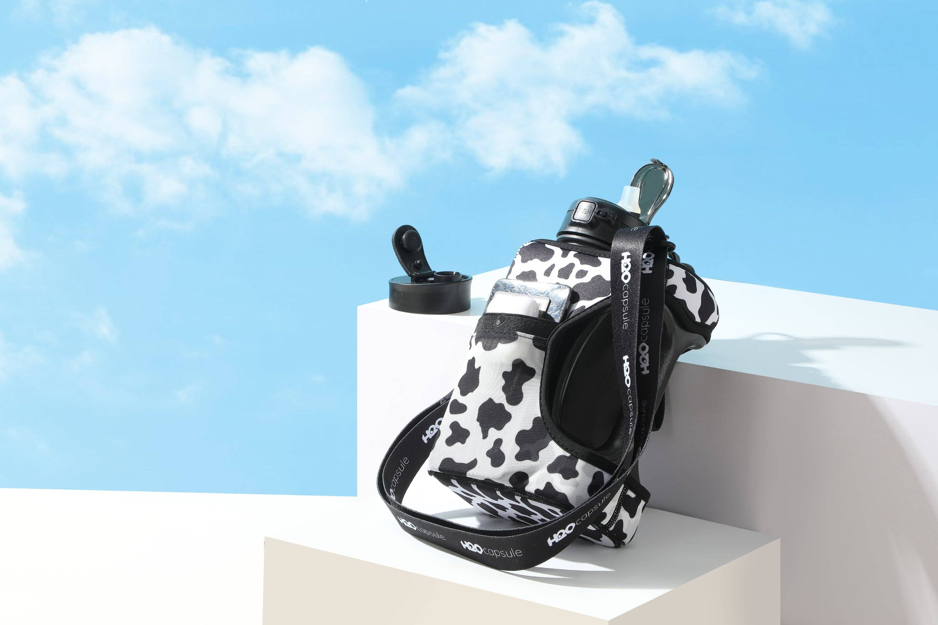H2O Capsule – wholesale Water bottle – Cow - Cube - Half Gallon Water Bottle with Storage Sleeve and 2 lids5