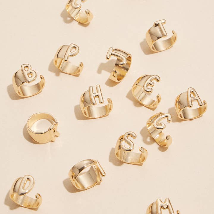 Set of 16 Bubble Design Initial Gold Plated Rings for wholesale by Frem