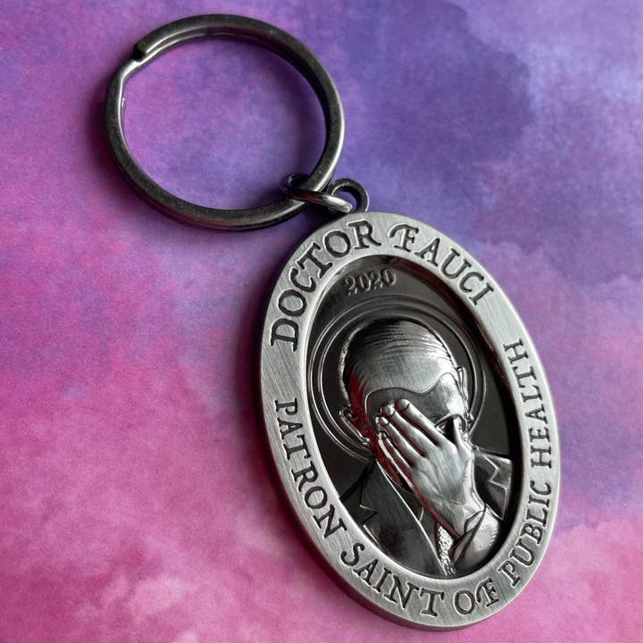 Fauci é um chaveiro de Saint por atacado de Rad Girl Creations