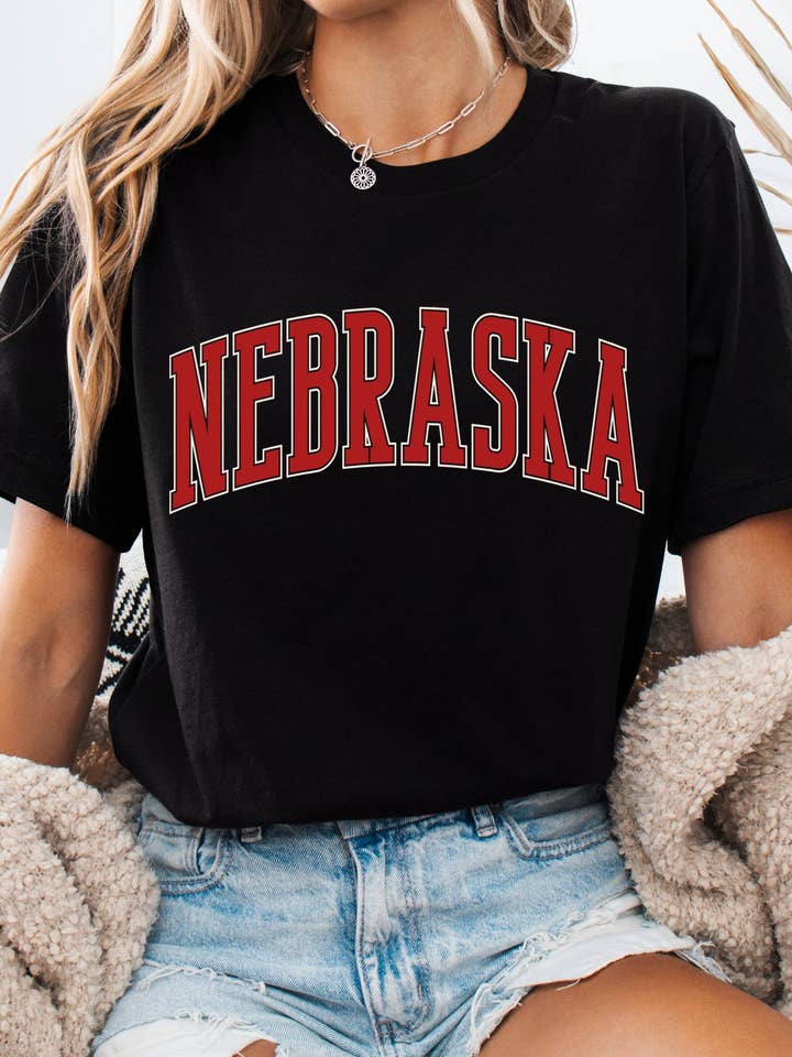 NEBRASKA PUFF GRAPHIC TSHIRTS and other Purchase Wholesale huskers. Free Returns & Net 60 Terms on Faire trending on Faire.