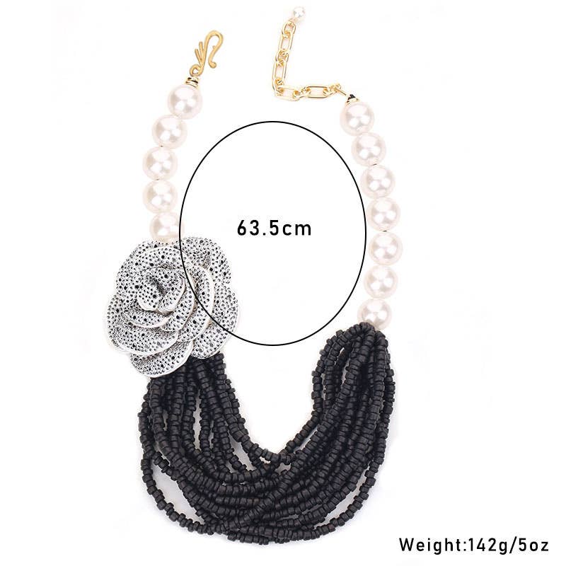 PEACH ACCESSORIES - Venta al por mayor Collares de cuentas/perlas - Collar de Flores con Cuentas y Perlas Sintéticas en Negro NEK5434