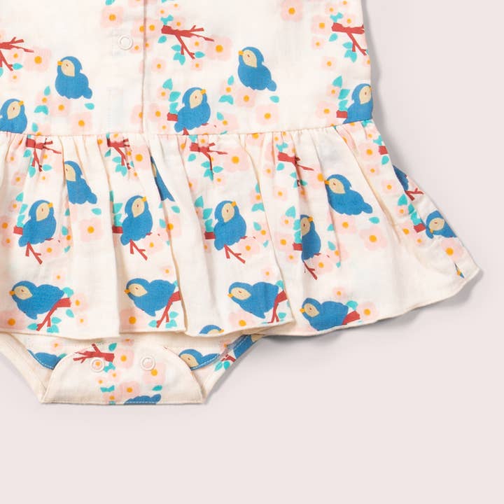 Bluebirds Button Ruffle Romper for wholesale on Faire