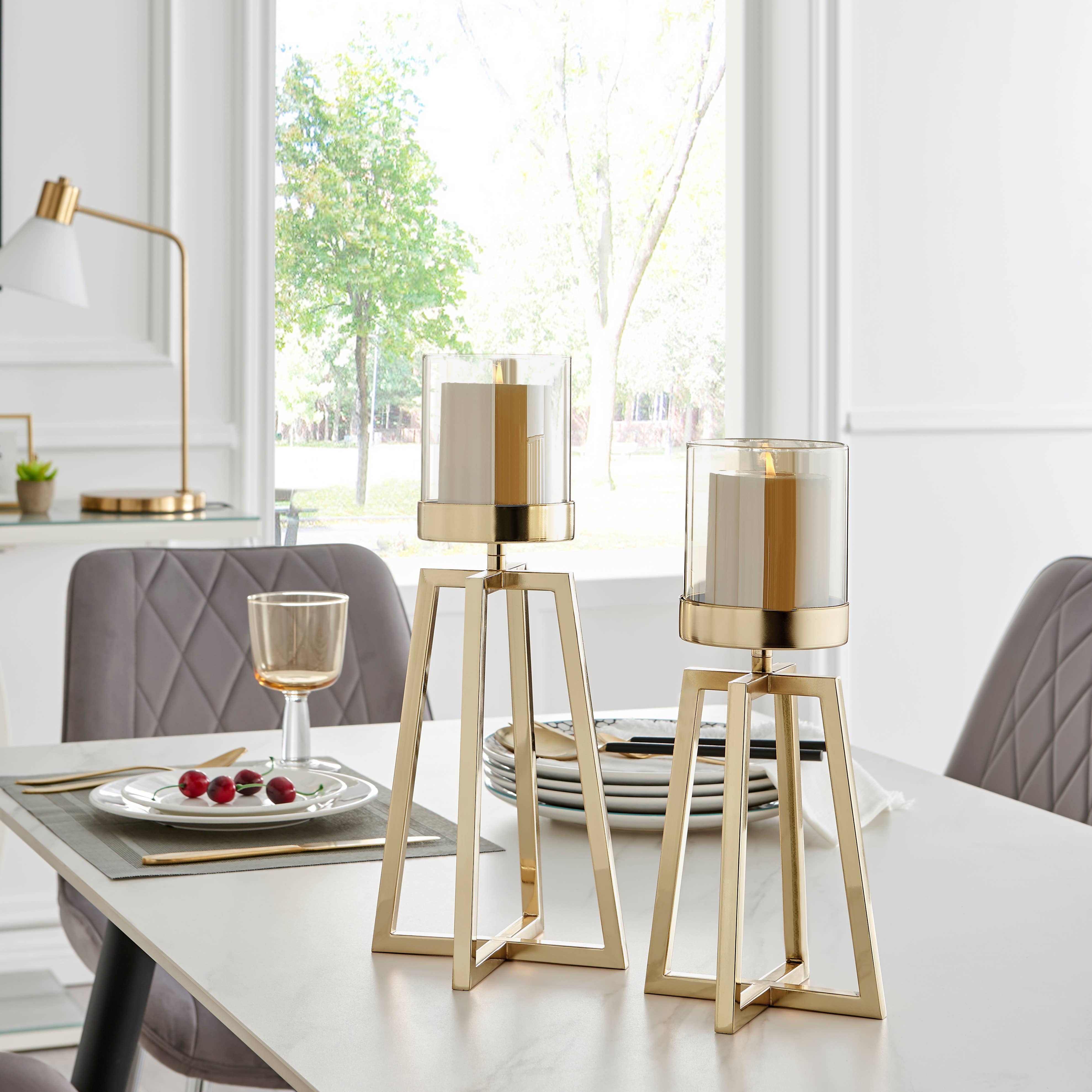 Danya B – wholesale Ljushållare – Maeve guldljusstakar med fot och tonat glas – set om 23