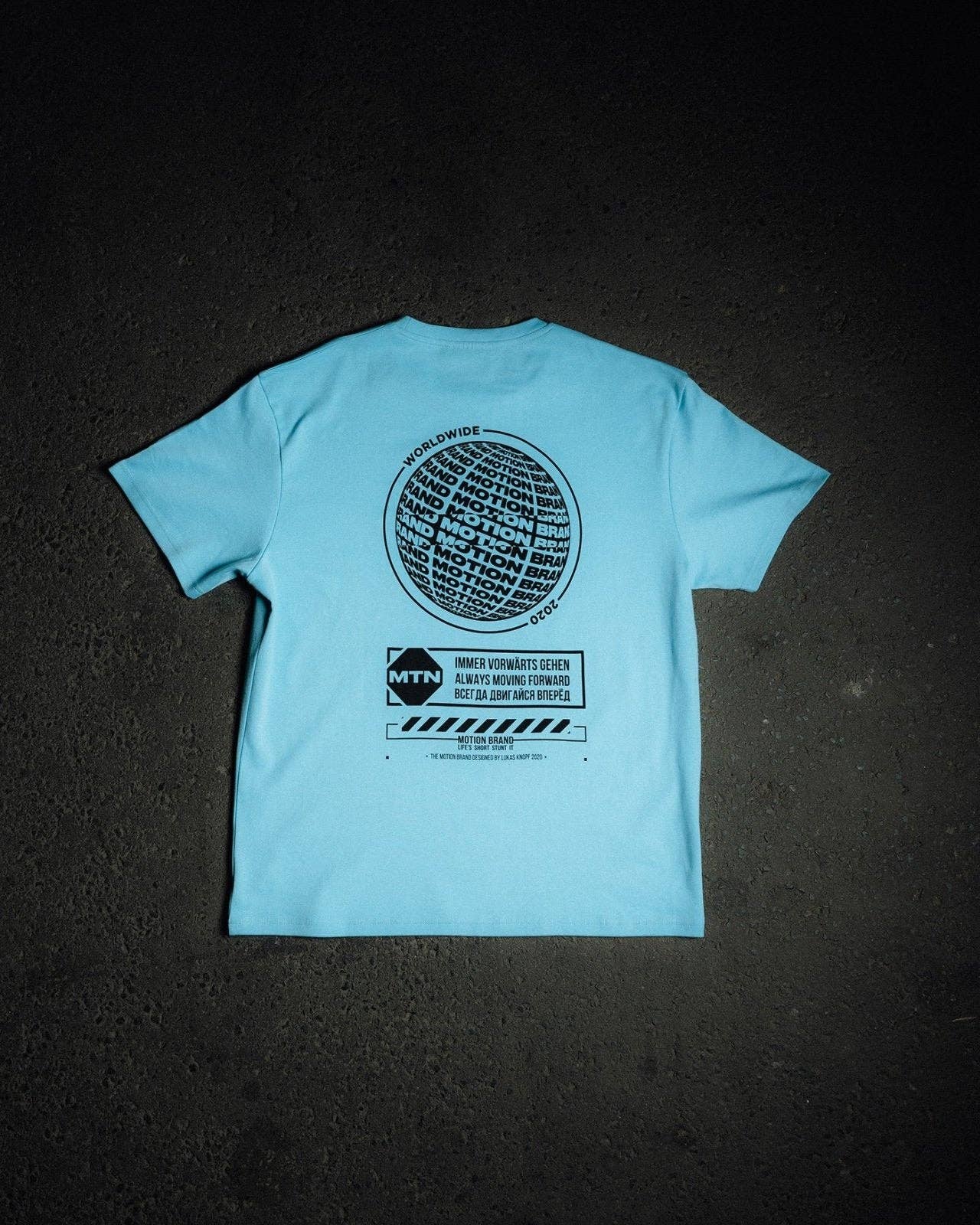 The Motion Brand - Venta al por mayor Camiseta serigrafiada - Hombre - Camiseta Worldwide1