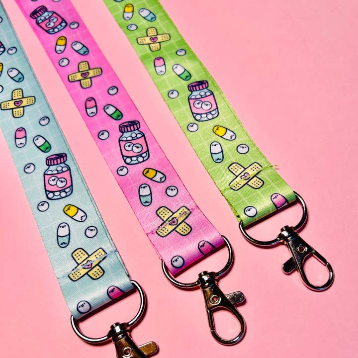 Happy Pills Lanyard and other Purchase wholesale lanyards with logo. Free returns & net 60 terms on Faire trending on Faire.