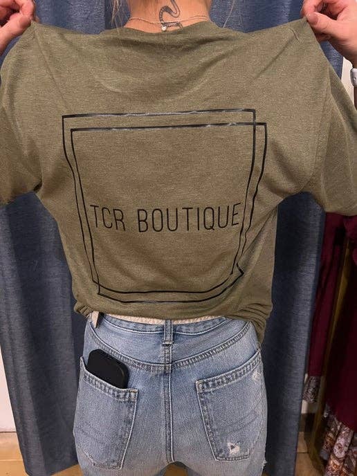 Tee-shirt à logo TCR Boutique pour la vente par TCR Boutique