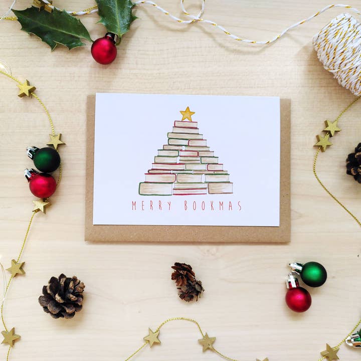 Carte de Noël joyeux Bookmas pour la vente par The Curious Cactus