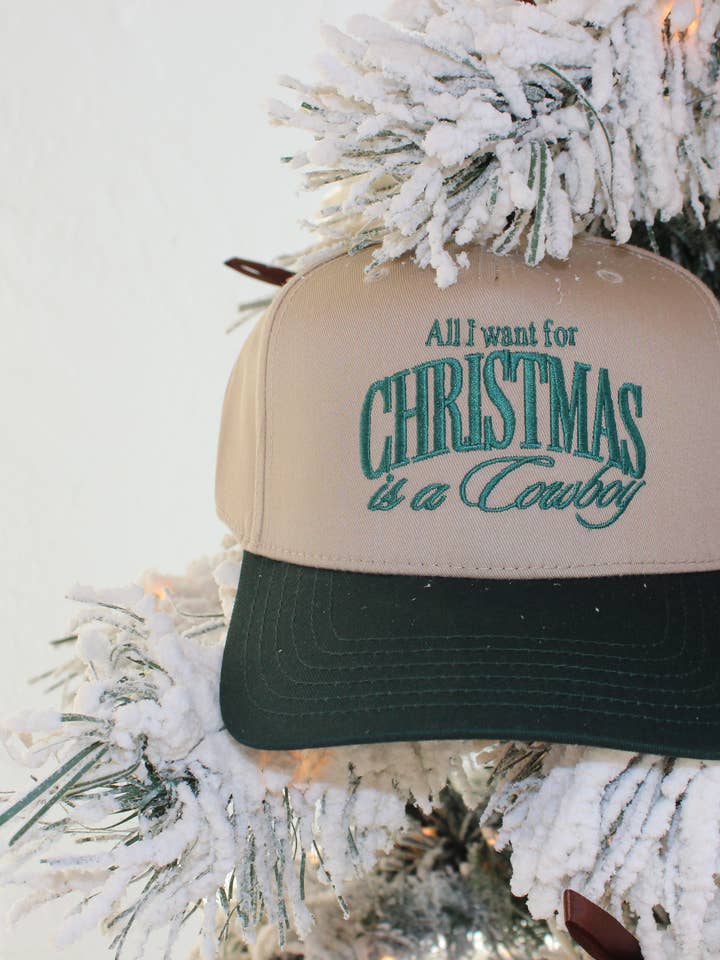 All I Want For Christmas Is A Cowboy Trucker Hat for wholesale by 920 Threads