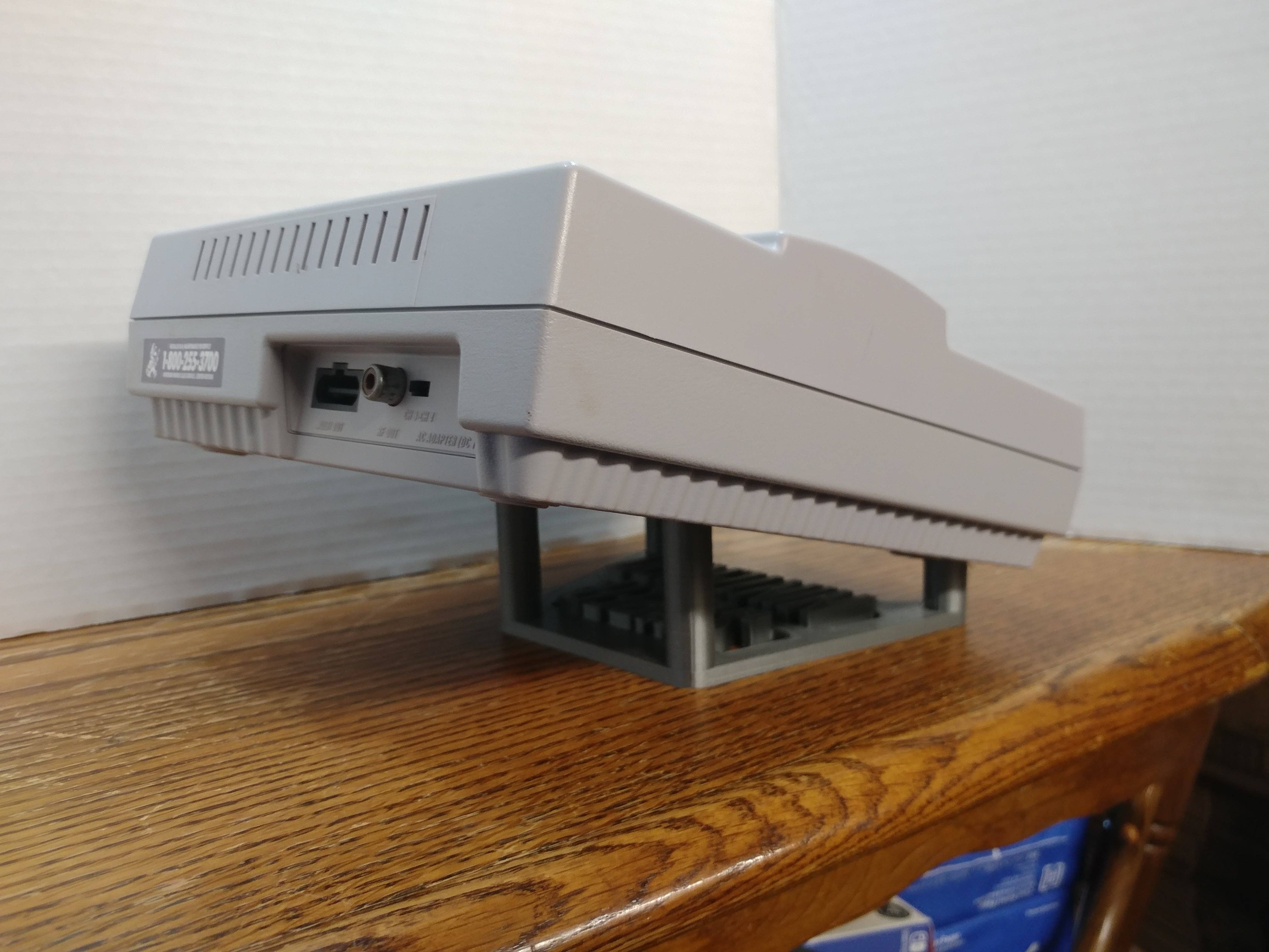 XALT 3D DESIGNS - Wholesale Retailer Display Stand/Case - Super Nintendo (SNES) Console Stand3