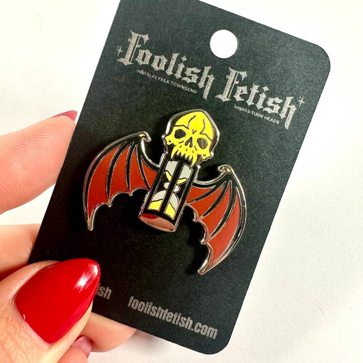 Memento Mori Winged Hourglass Skull Pin for wholesale by Foolish Fetish