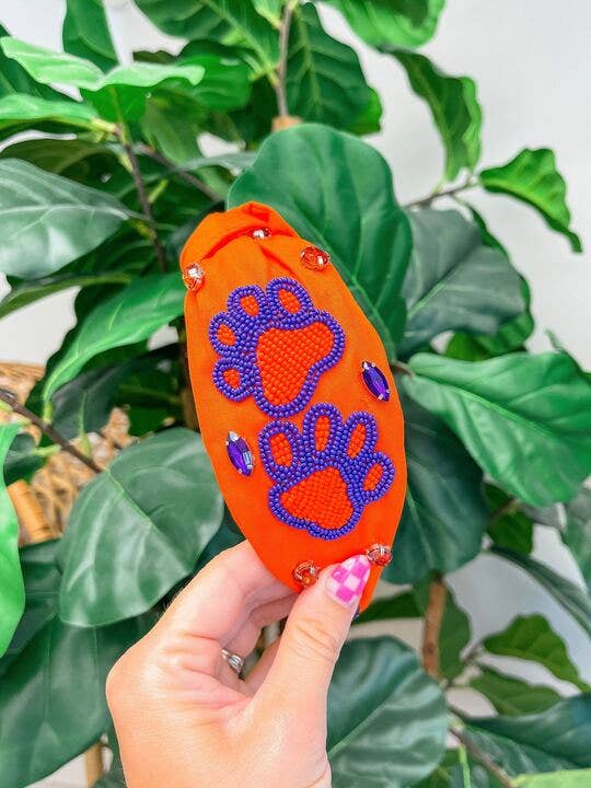 Paw Print Game Day Embellished Headband - Purple & Orange for wholesale by Prep Obsessed Wholesale