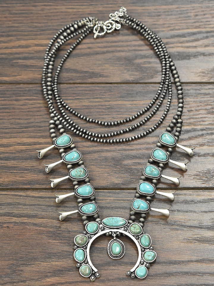 733281, Squash Blossom Turquoise Necklace for wholesale by ISAC Trading Inc