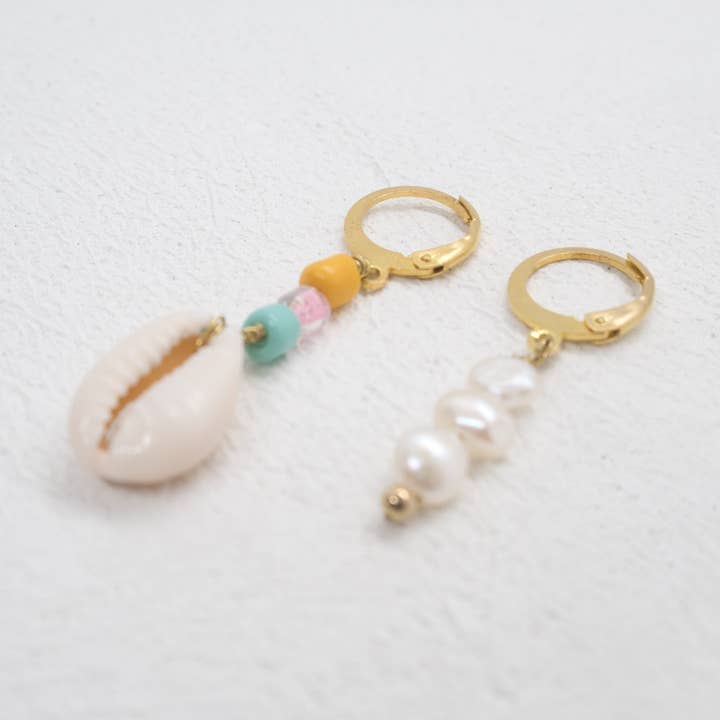 ORECCHINI SPAIATI IN PELLE SALATA per la vendita all'ingrosso da parte di CIAO.STUDIOS