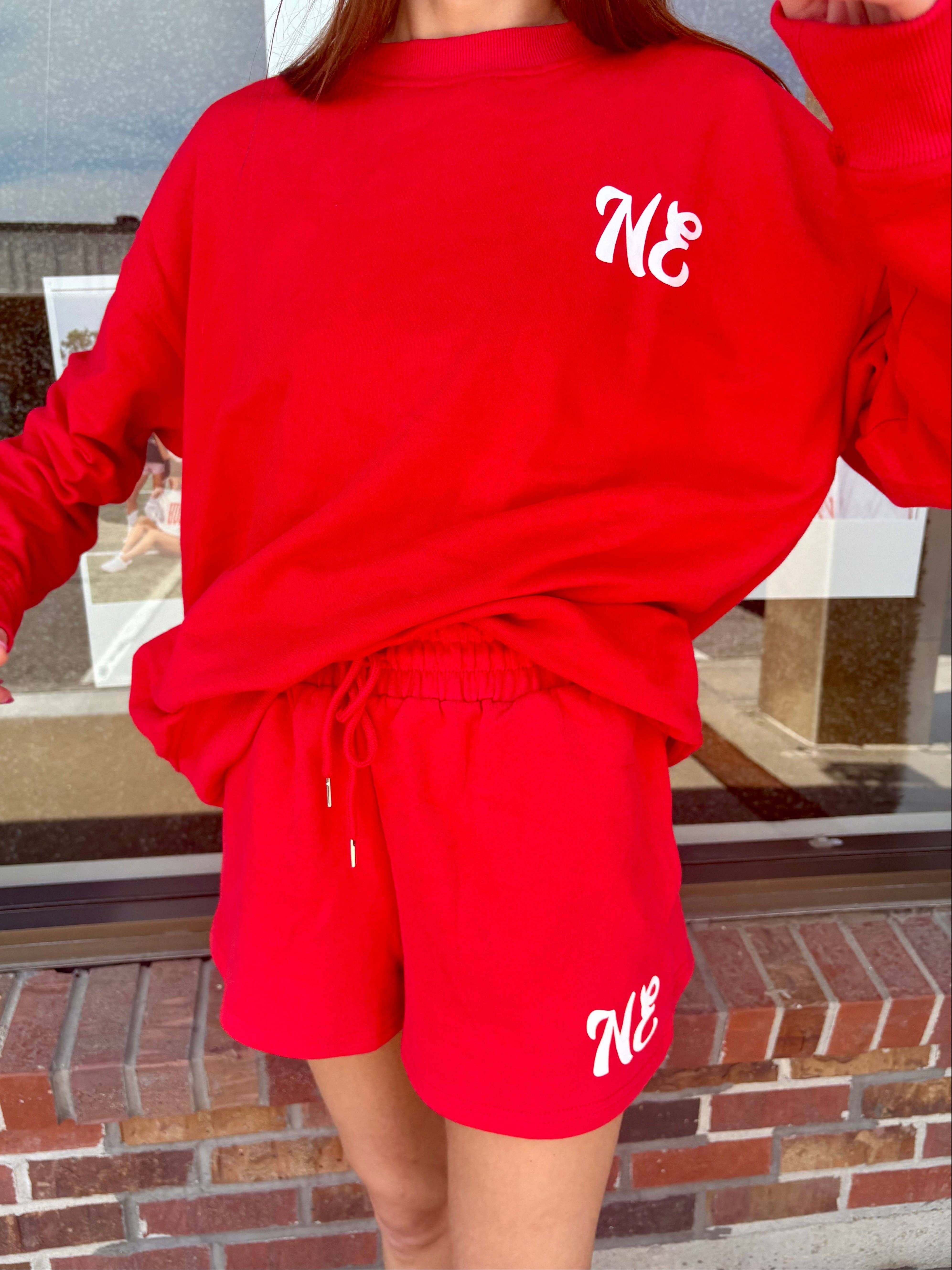 Red NE Good Life Core Sweatshirt for wholesale on Faire1