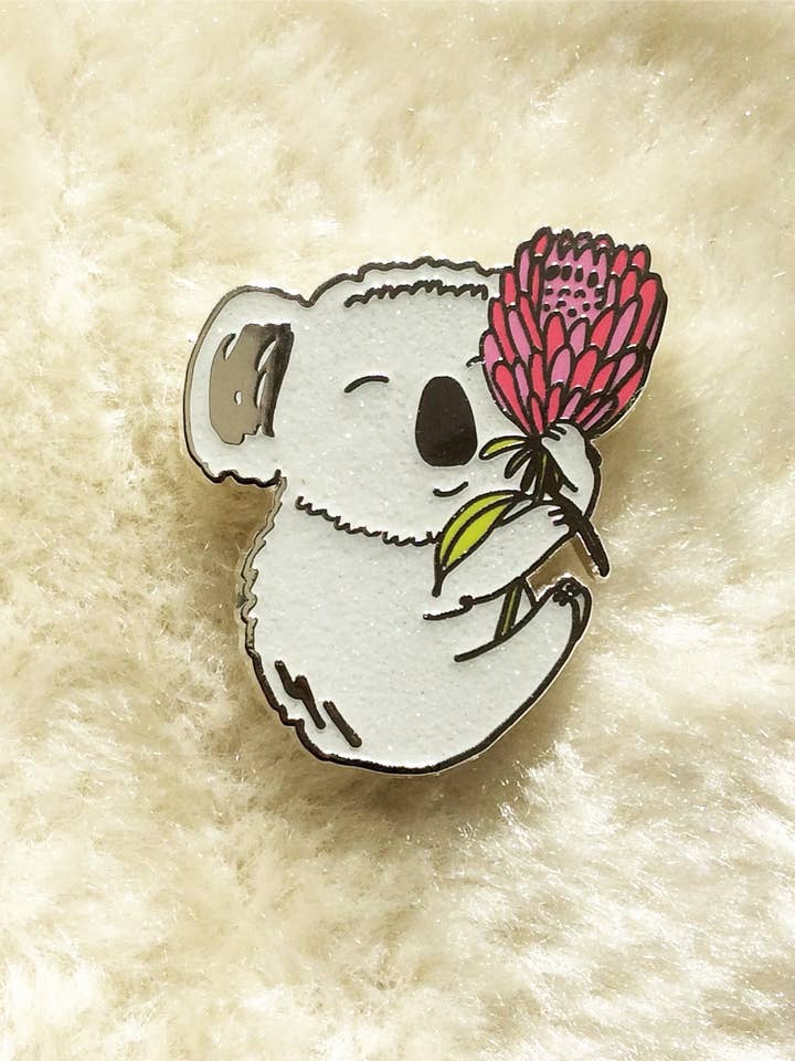 Koala Hugging Protea Flower Enamel Pin for wholesale by Missy Minzy