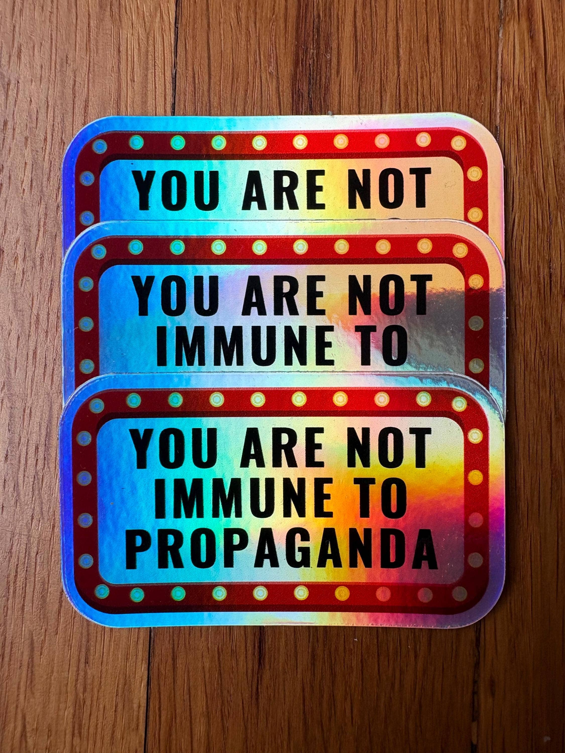 Anna Liz Heart Designs - Wholesale Sticker - Activist Vinyl Sticker – You Are Not Immune To Propaganda7