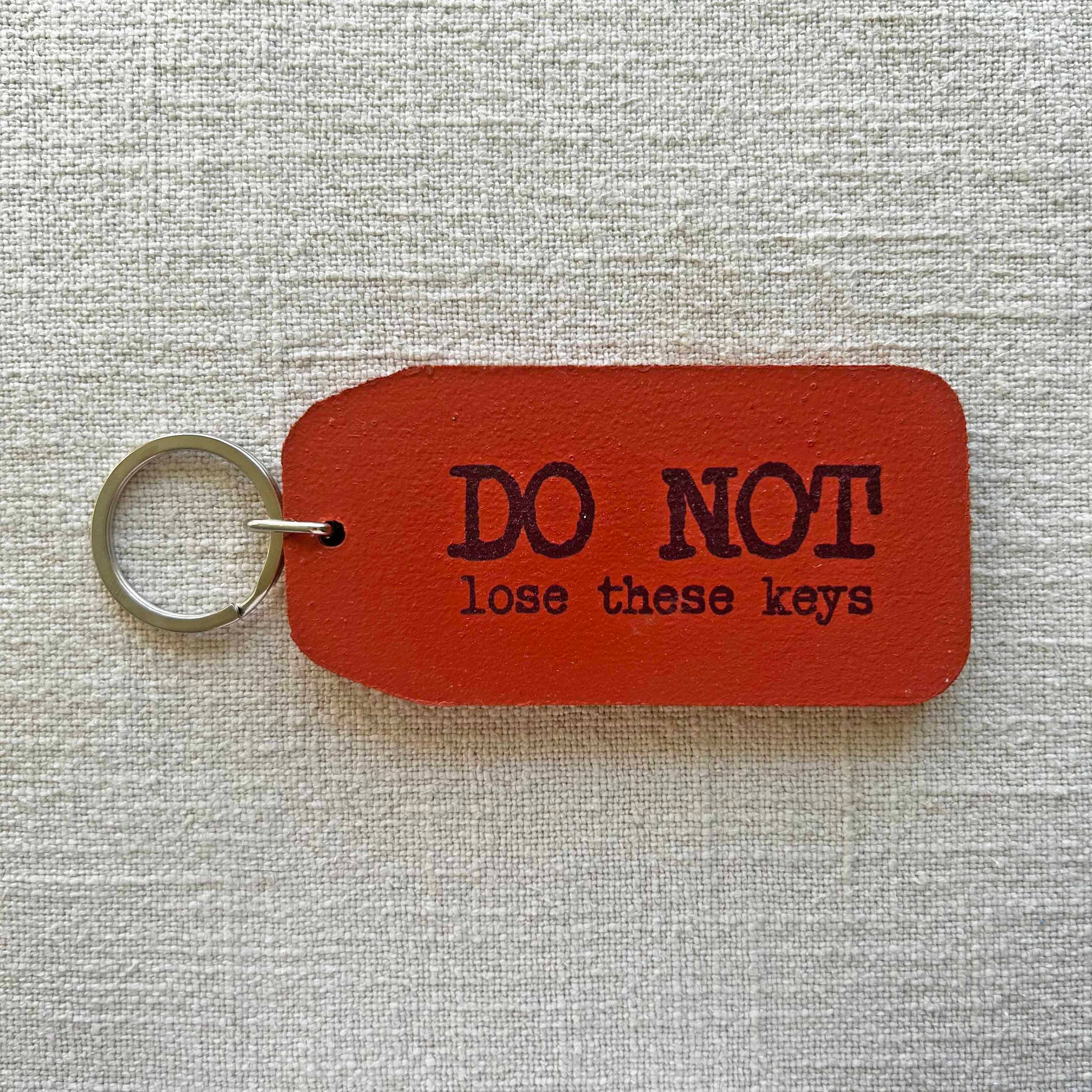 THE WOODEN POSTCARD COMPANY – wholesale Keychain – Unisex – Do Not Lose These - Wooden Key Tag1